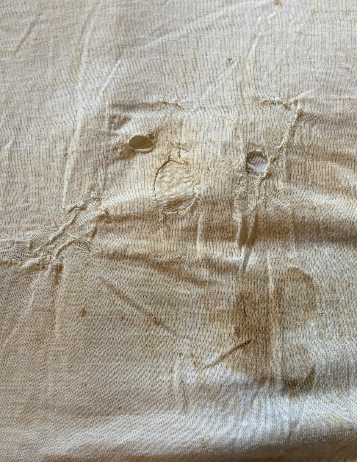 Heavily Distressed & Repaired 50's T Shirt